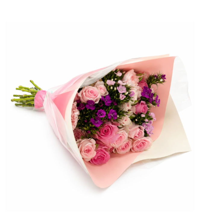 Pinkish mixed flower bouquet with 15 stems from Black Tulip, featuring a random assortment of colorful blooms.