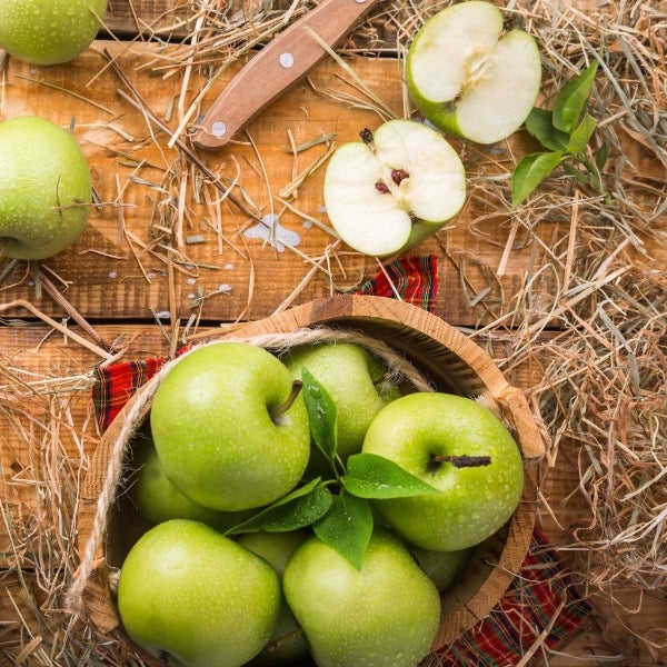 Fresh Granny Smith apples in a 1 kg pack, bright green fruit with smooth skin, from the Sharbatly brand.