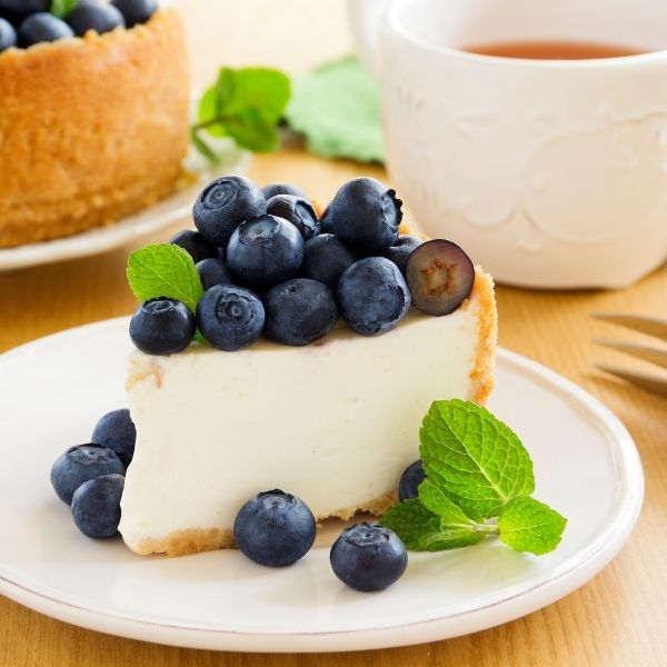 Fresh blueberries in a 0.125 kg pack, showcasing vibrant blue color and plump, juicy appearance.