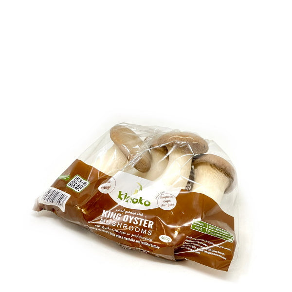 Fresh king oyster mushrooms from U.A.E, 0.4 kg pack, showing plump, white caps and thick stems on a clean surface.