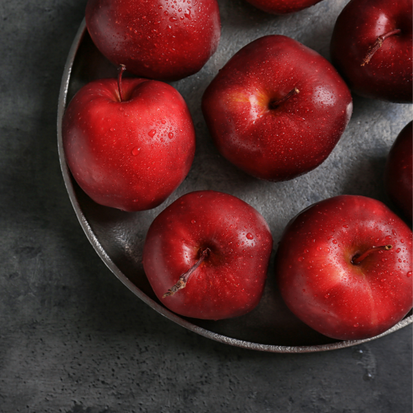 Red Delicious apples from Sharbatly in a 3 kg carton, showcasing bright red, fresh, and ripe fruit ready to eat.